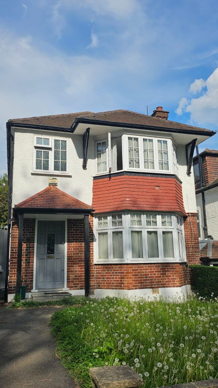 Photo 1: front of house