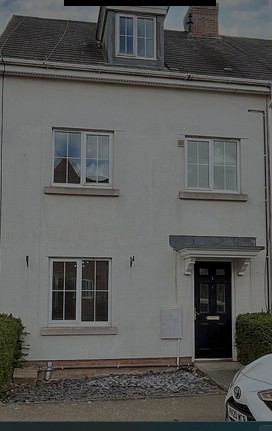 Photo 1: Front view of the house