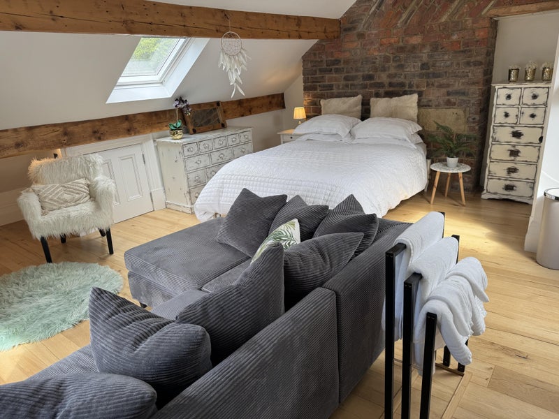 Photo 1: Chalfont, Brownhill - Corner sofa and King size bed. 