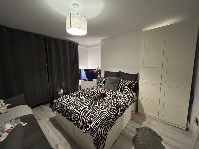 Photo 1: Different layout of room, bay window behind curtain