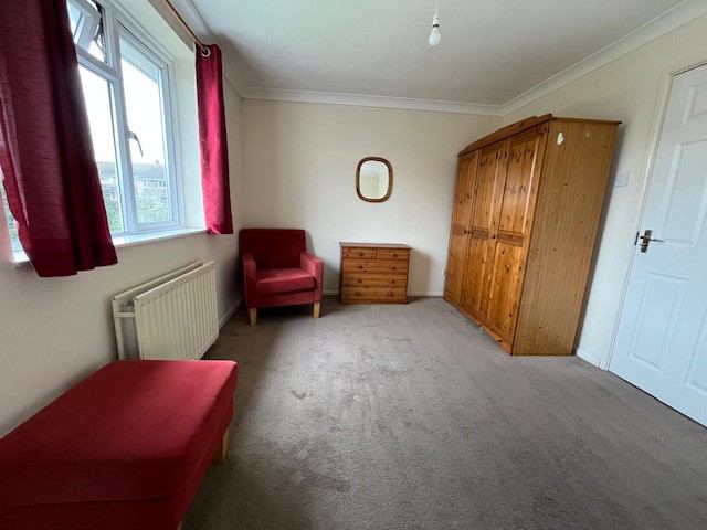 Photo 1: Large bedroom with seating