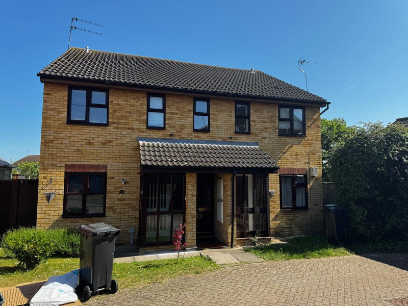 Photo 1: Front of the property