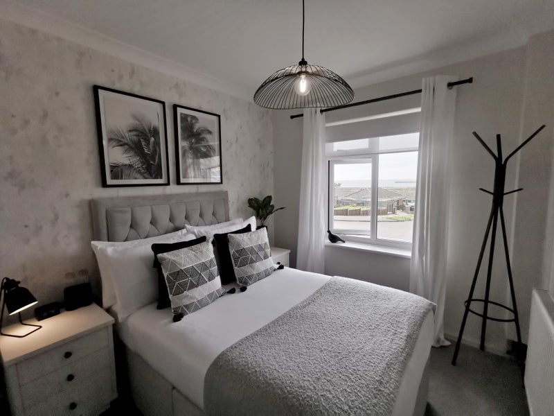 Photo 1: Small double bed 