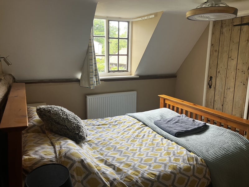 Photo 1: Bedroom has built in wardrobe, ceiling fan