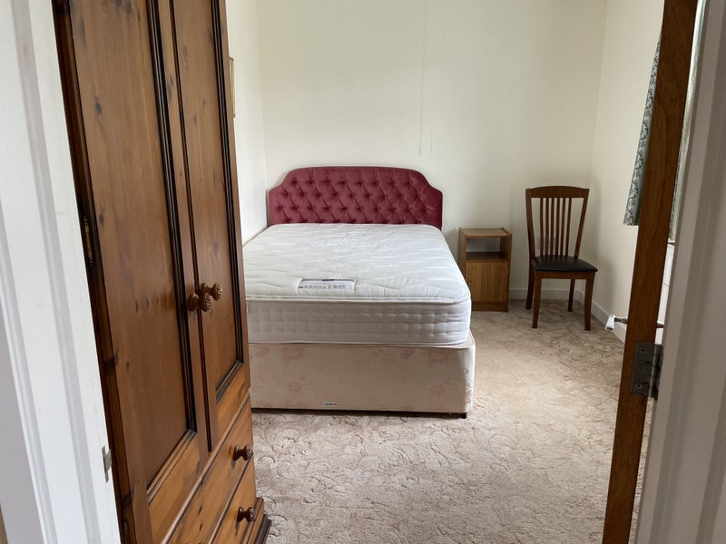 Photo 1: Bedroom with bed & wardrobe, bedside cabinet