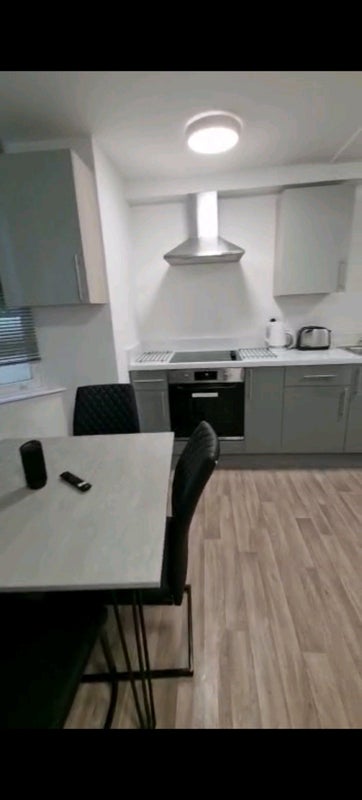 Photo 1: Shared Living Room