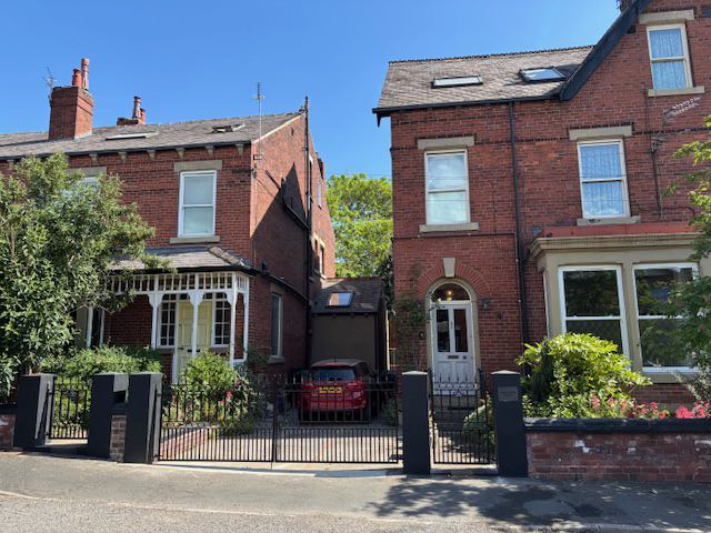 Photo 1: House on the right - facade