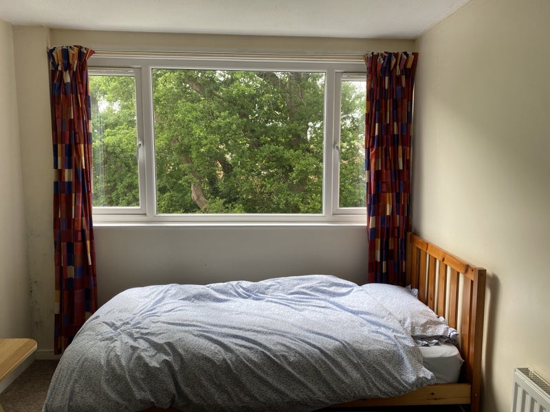 Photo 1: Double bedroom with large window opening in the garden 