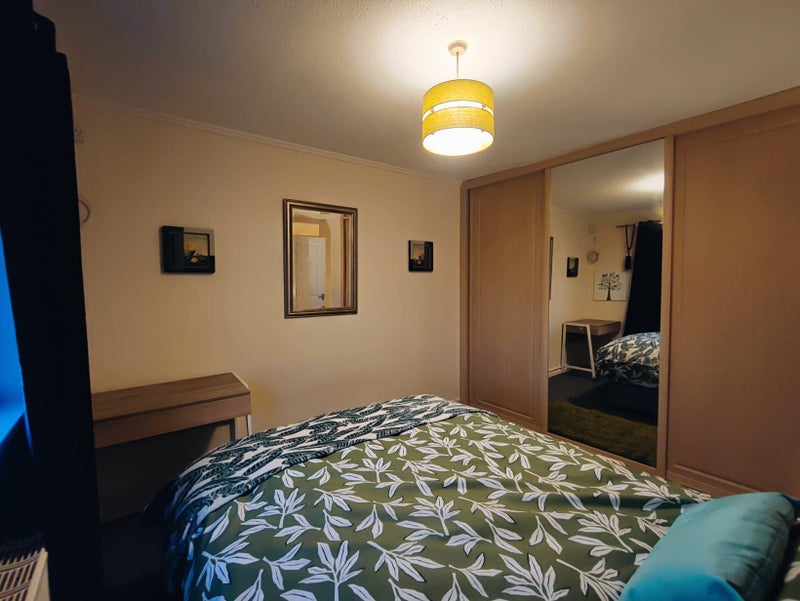 Photo 1: Bedroom with built-in wardrobe