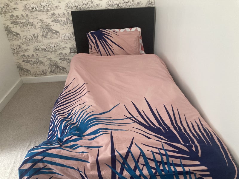 Photo 1: Single bed