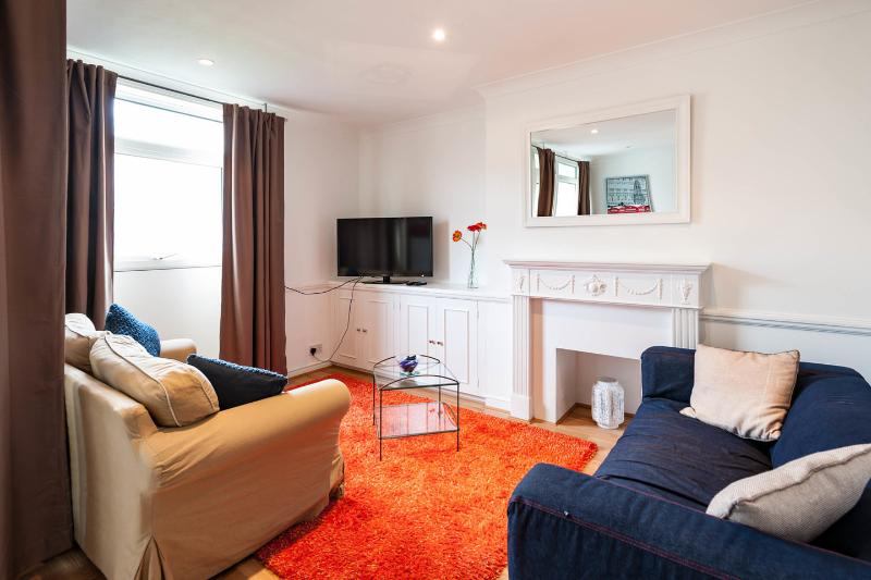 Photo 1: Light & airy living area 