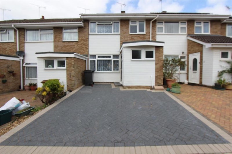 Photo 1: Front of house with parking