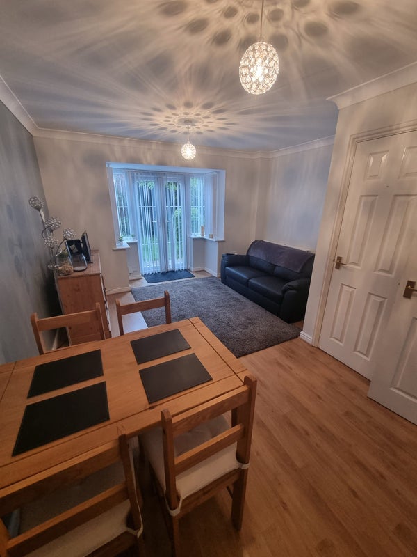 Photo 1: Living/dining area