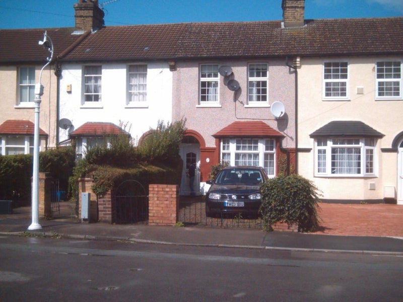Photo 1: Street and front