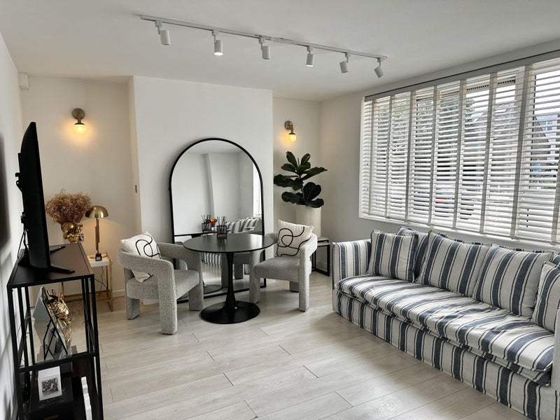 Photo 1: Stylish Living Room