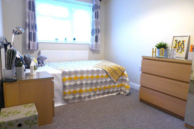 Photo 1: Lots of storage + comfy bed