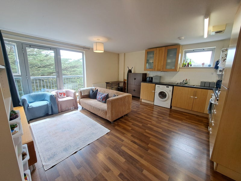 Photo 1: Open plan living room