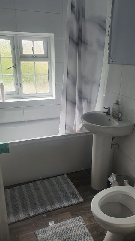 Photo 1:  Shared bathroom
