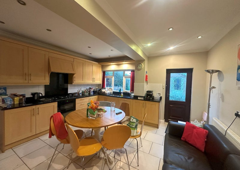 Photo 1: Communal kitchen/diner