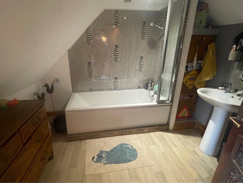 Photo 5: The shared bathroom