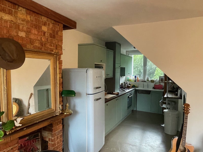 Photo 1: Dining room into kitchen