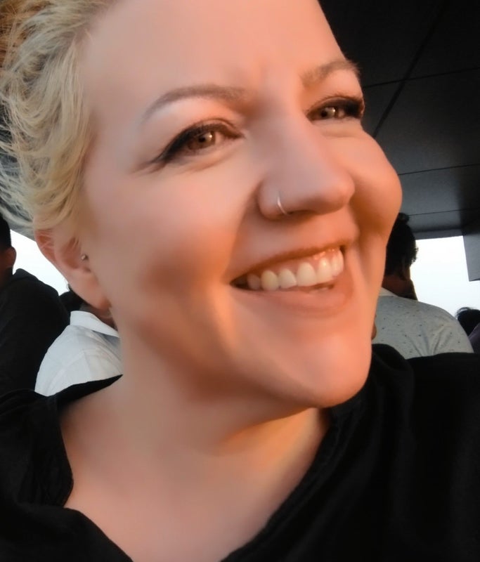 Photo 1: Me on a boat in India