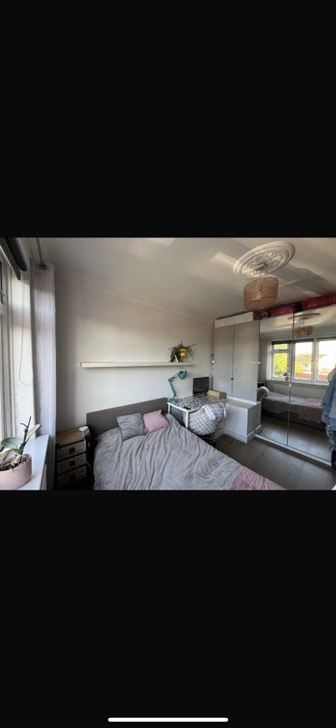 Photo 1: Rooms all cleared out only thing left is the bed and tall wardrobes. 