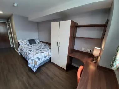 Photo 1: Bedroom with toilet