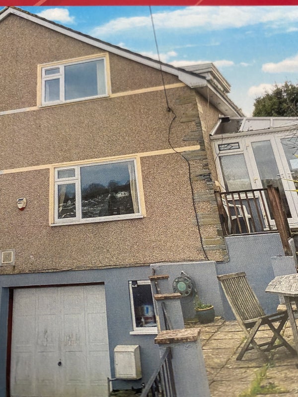 Photo 1: Town house