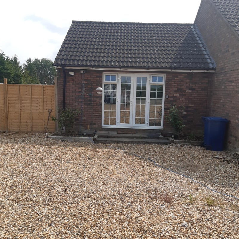 Photo 1: Front Entrance and parking