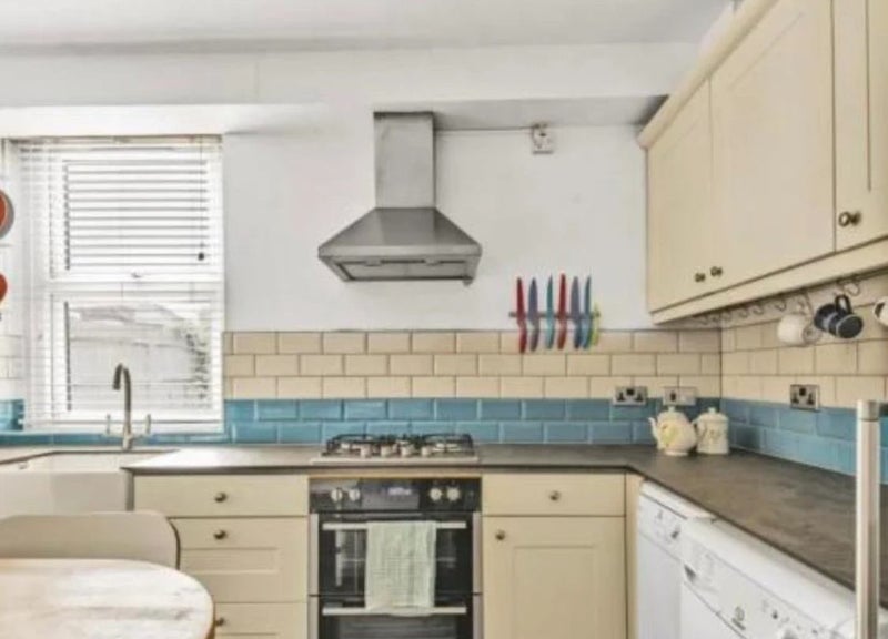 Photo 1: Kitchen with eat in dining 