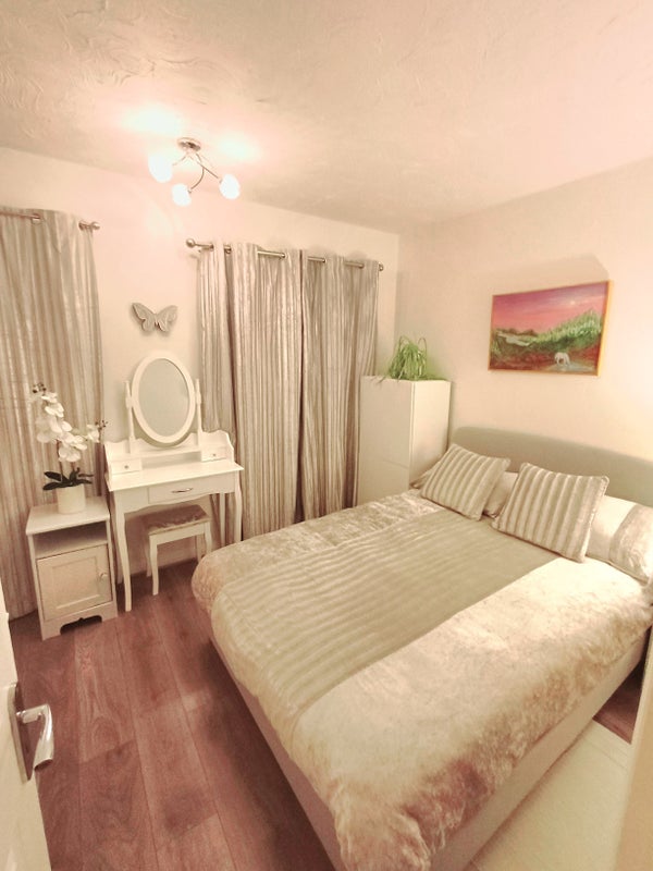 Photo 1: Front bedroom 