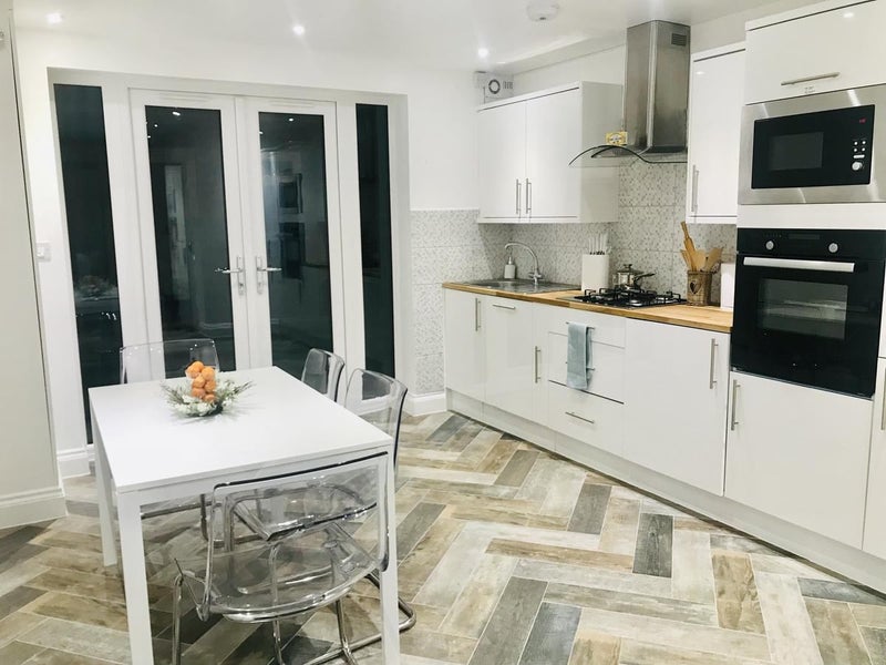 Photo 1: Dining Room and Kitchen