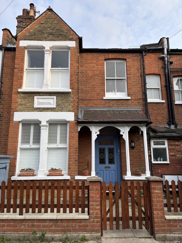 Photo 1: Front of house