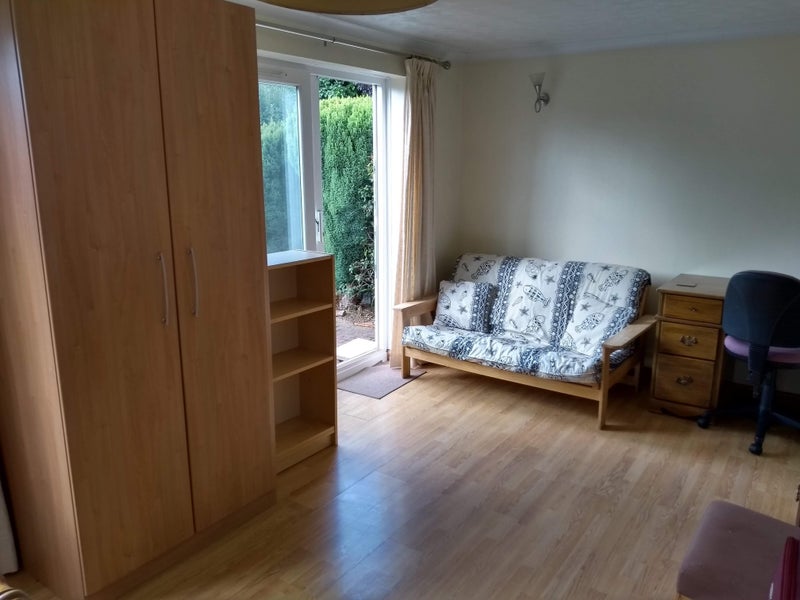 Photo 1: Rm1 - showing patio doors - into back garden