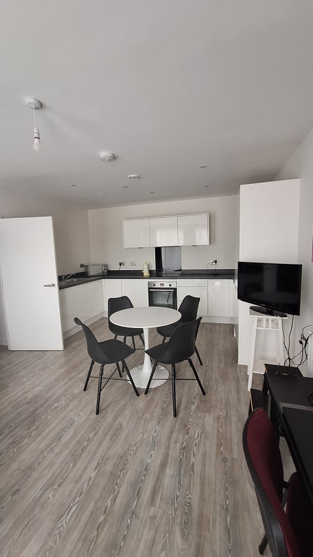 Photo 1: Shared living room