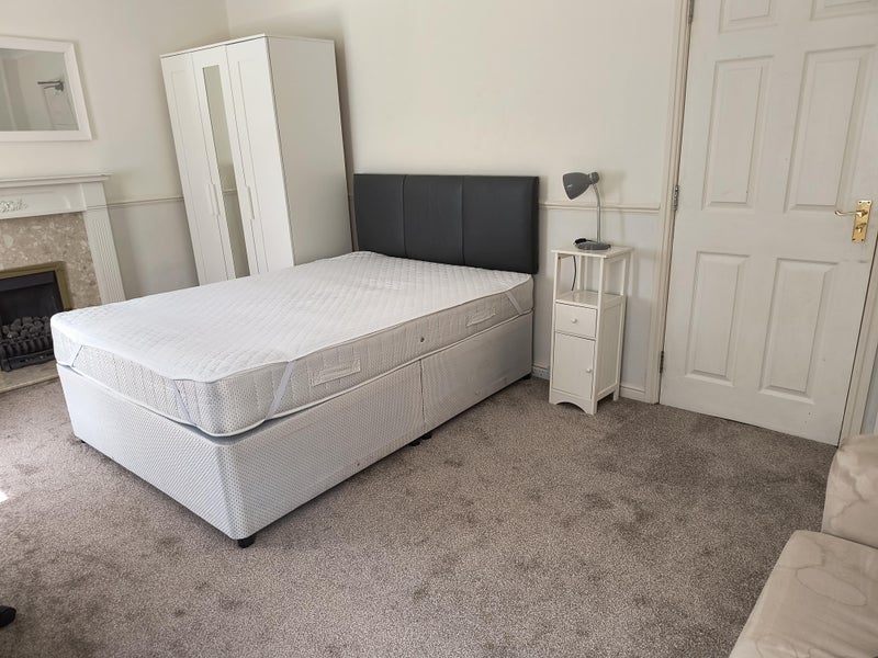 Photo 1: Bed and wardrobe