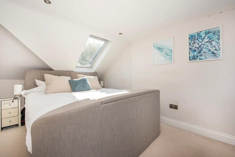 Photo 1: The master bedroom, with lots of natural light.