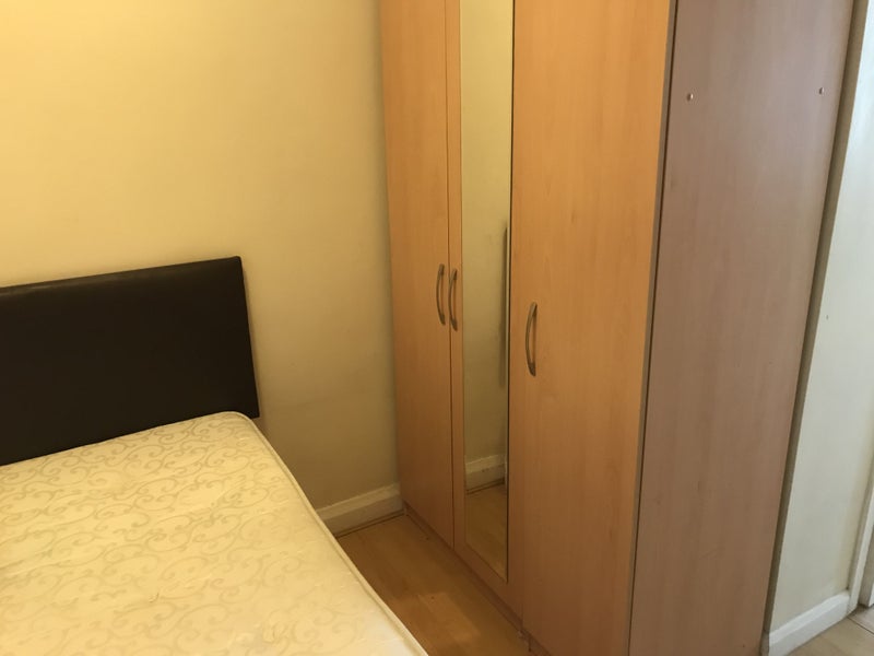 Photo 1: Bedroom and cardboards 