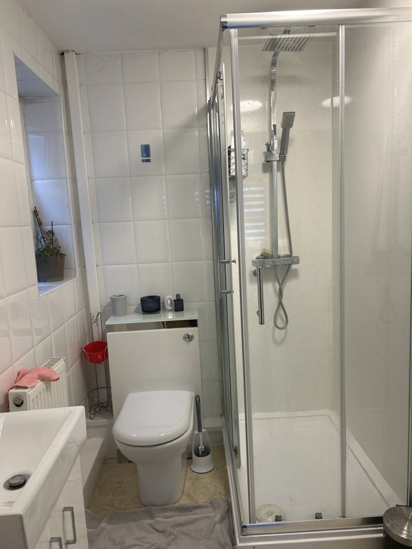 Photo 1: Shower attached