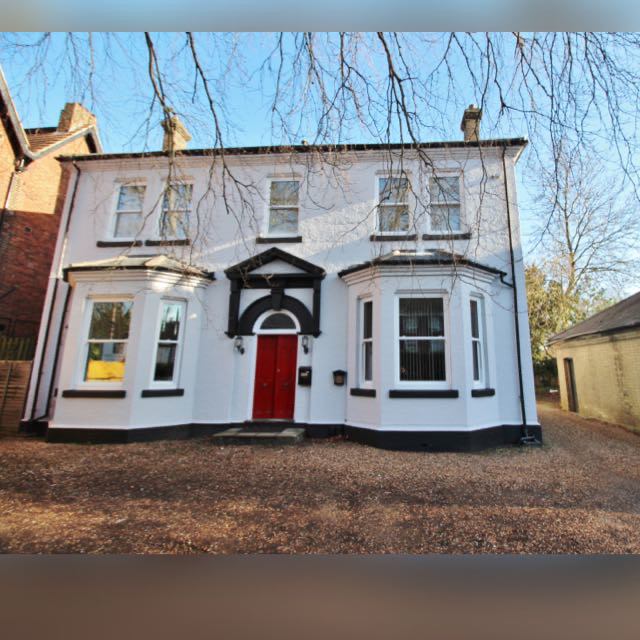 Photo 1: Front of house