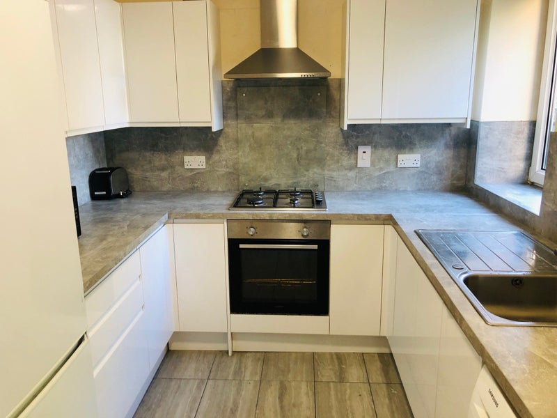 Photo 1: Kitchen