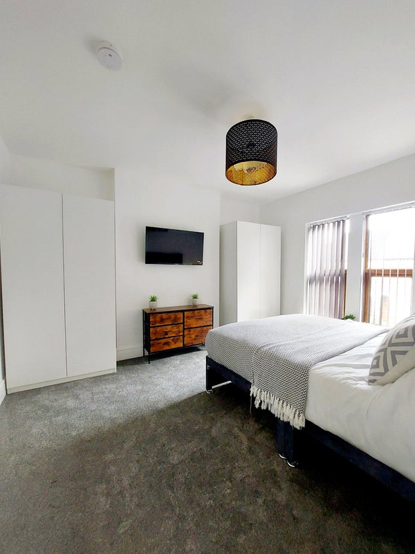 Photo 1: Room 6 Bedroom with lots of storeage and smart TV