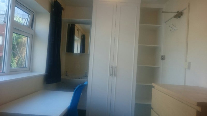 Photo 1: Single room with wardrobe, sink, desk and drawers