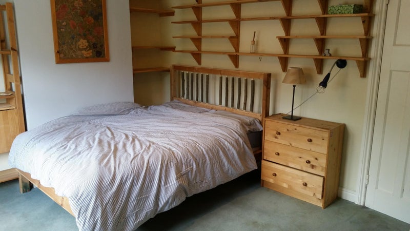 Photo 1: Double bed and storage 