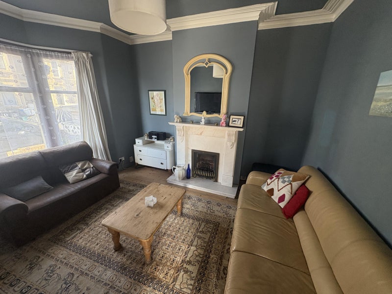 Photo 1: Shared Living room with TV & Amazon Fire Stick- Free Wifi