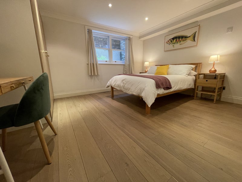 Photo 1: Massive bedroom with lots of open floor space
