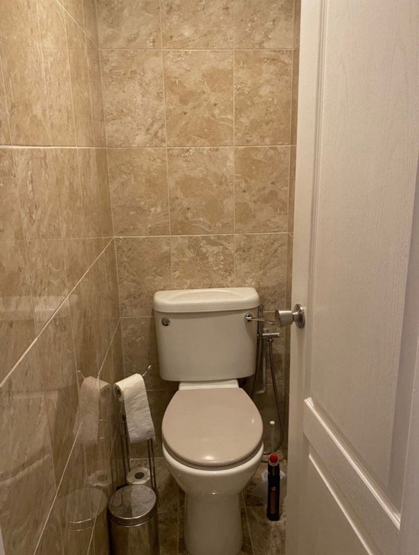 Photo 1: Separate toilet from the shower 