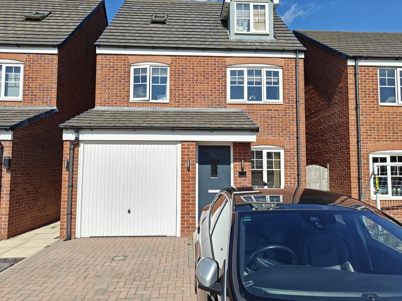 Photo 1: Front of house