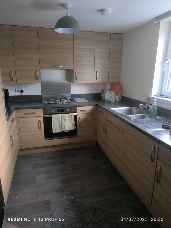 Photo 1: Modern kitchen with all the mod cons